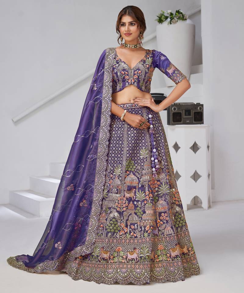 Divine Elegance in Purple – Bridal Lehenga with Temple & Cow Motifs