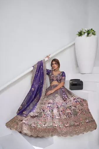 Divine Elegance in Purple     Bridal Lehenga with Temple & Cow Motifs