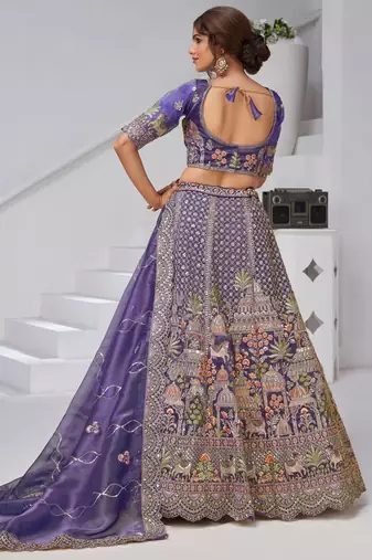 Divine Elegance in Purple     Bridal Lehenga with Temple & Cow Motifs
