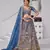 Teal Blue Raw Silk Bridal Lehenga Featuring Temple, Cow & Floral Embroidery