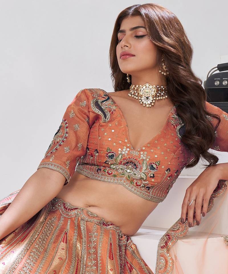 Grace in Rust – Elegant Lehenga with Golden Detailing