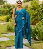 turquoise plain stone work border silk blend saree with unstiched blouse piece
