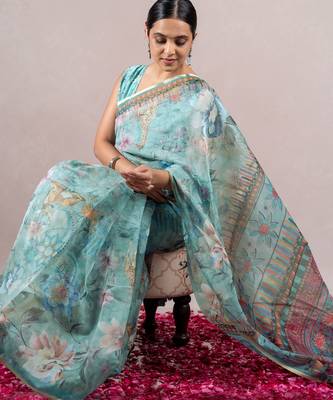 turquoise floral print zari woven border organza saree with unstiched blouse piece 2