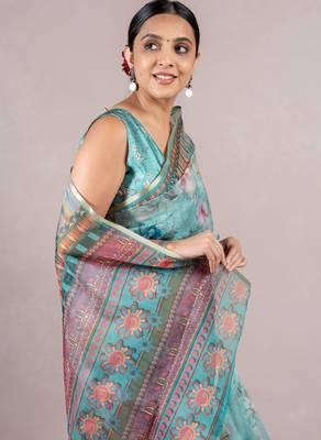 turquoise floral print zari woven border organza saree with unstiched blouse piece 3