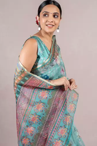 turquoise floral print zari woven border organza saree with unstiched blouse piece