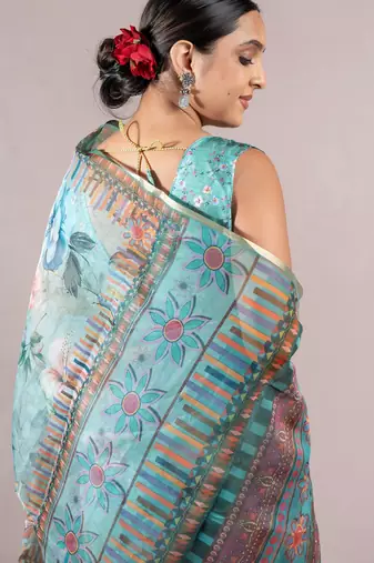 turquoise floral print zari woven border organza saree with unstiched blouse piece