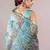 turquoise floral print zari woven border organza saree with unstiched blouse piece