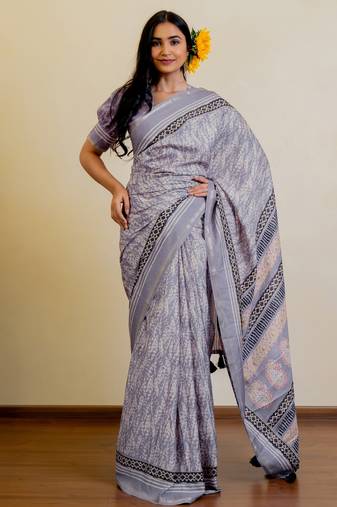 lavender geometric print zari woven border silk blend saree with unstiched blouse piece