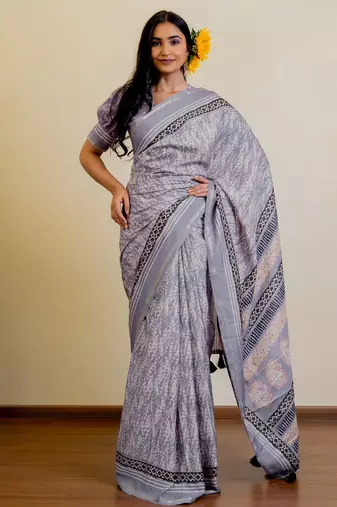 lavender geometric print zari woven border silk blend saree with unstiched blouse piece