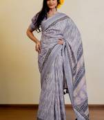 lavender geometric print zari woven border silk blend saree with unstiched blouse piece