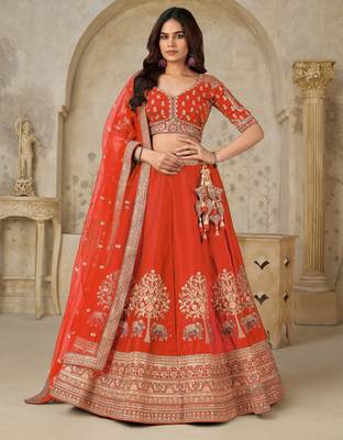 Trendy Rust Wedding Lehenga with Elephant Motifs 1