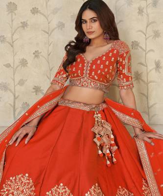 Trendy Rust Wedding Lehenga with Elephant Motifs 2