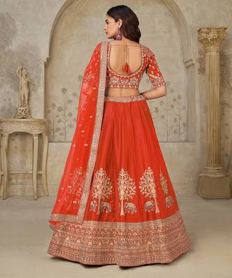 Trendy Rust Wedding Lehenga with Elephant Motifs 4