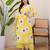 Floral printed yellow v-neck pure cotton kurta with trouser