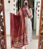 Floral embroidered white round neck silk kurta with trouser with dupatta