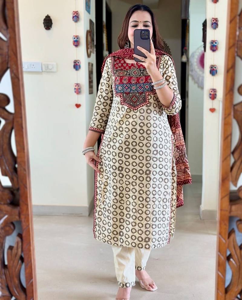 Floral embroidered white round neck silk kurta with trouser with dupatta