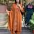 Floral printed orange round neck pure cotton kurta with trouser with dupatta