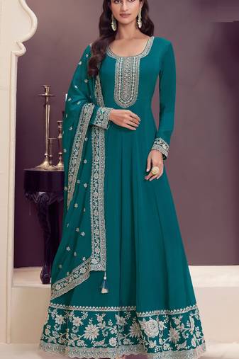 Dark green embroderied silk anarkali suit