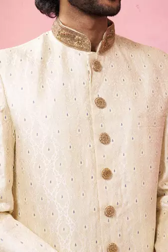 Yellow sherwani set with cream pyjama - traditional wedding set