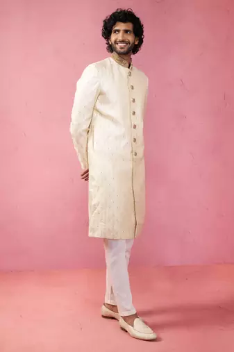 Yellow sherwani set with cream pyjama - traditional wedding set