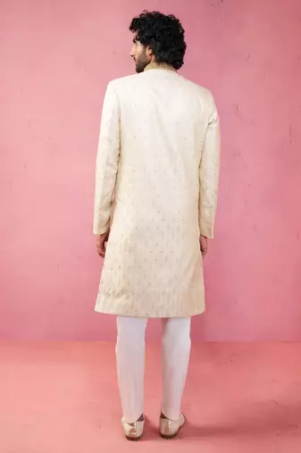 Yellow sherwani set with cream pyjama - traditional wedding set