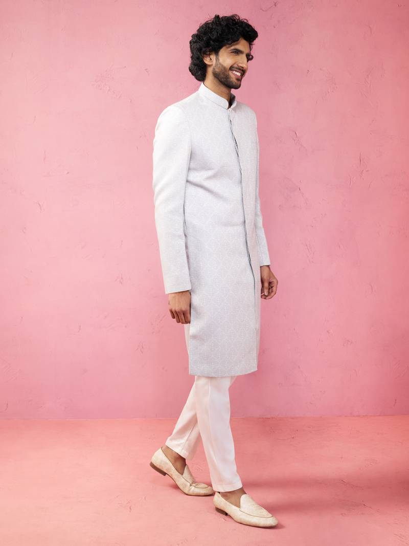 Vastramay men's Blue silk blend sherwani set with cream pyjama - kenzo jacquard wedding set