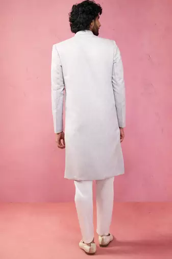 Blue silk blend sherwani set with cream pyjama - kenzo jacquard wedding set