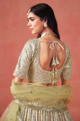 YELLOW GEORGETTE SEQUINS ZARI EMBROIDERED LEHENGA CHOLI