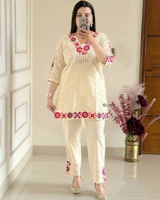 Floral embroidered white v-neck  cotton kurta with trouser 1