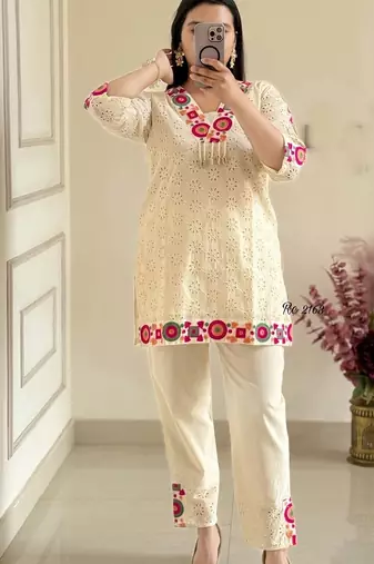 Floral embroidered white v-neck  cotton kurta with trouser