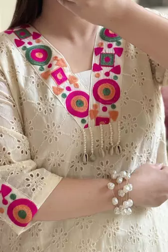 Floral embroidered white v-neck  cotton kurta with trouser