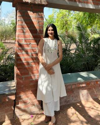 Floral embroidered white round neck  cotton kurta with trouser 1