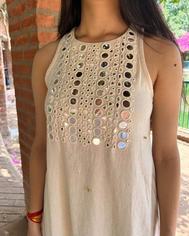 Floral embroidered white round neck pure cotton kurta with trouser