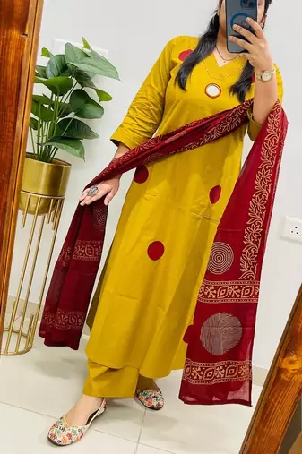 Floral embroidered yellow round neck  cotton kurta with trouser & dupatta set