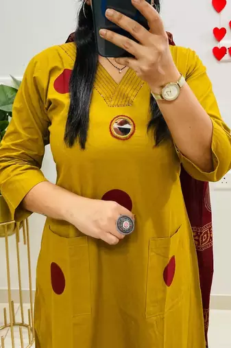 Floral embroidered yellow round neck  cotton kurta with trouser & dupatta set