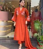 Floral embroidered orange v neck pure cotton kurta with trouser & dupatta set