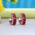 Red color american diamond earrings