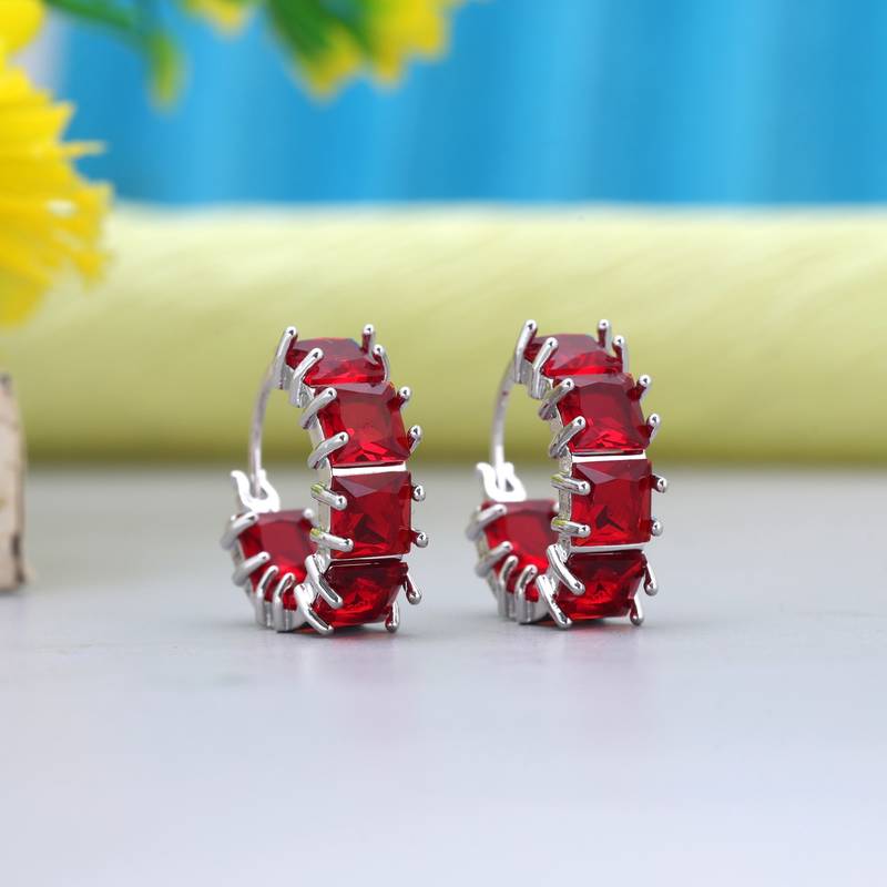 Red color american diamond earrings