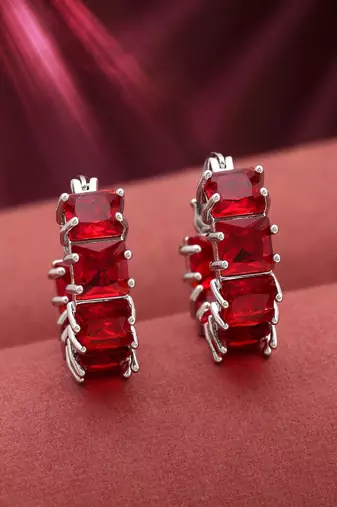 Red color american diamond earrings
