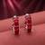 Red color american diamond earrings