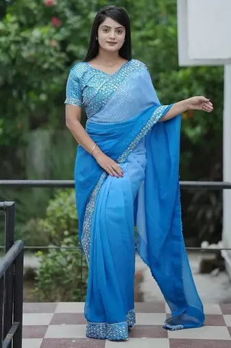 royalblue faux georgette with real mirror work lace border saree with blouse