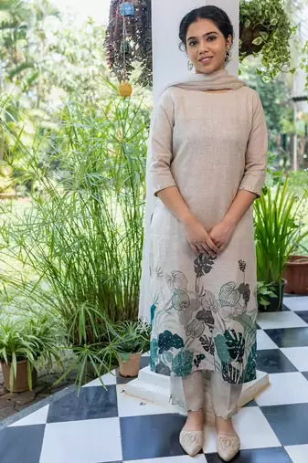 Floral printed off-white round neck silk kurta with trouser & dupatta set