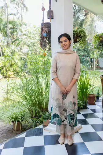 Floral printed off-white round neck silk blend kurta with trouser & dupatta set