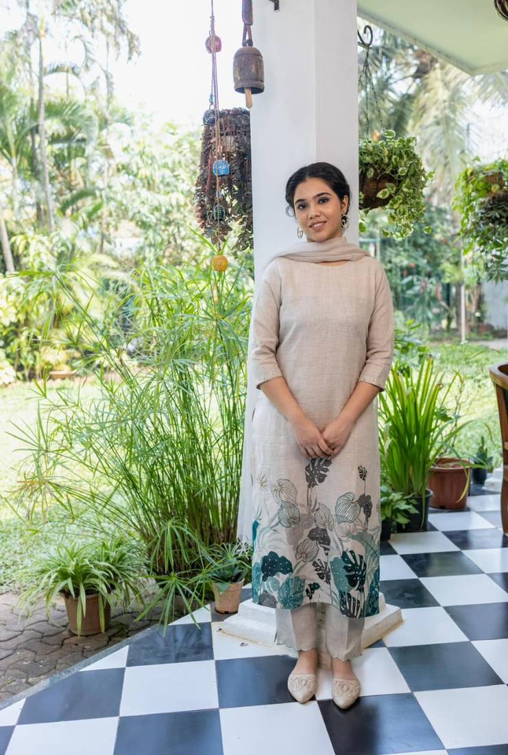 Floral printed off-white round neck silk kurta with trouser & dupatta set