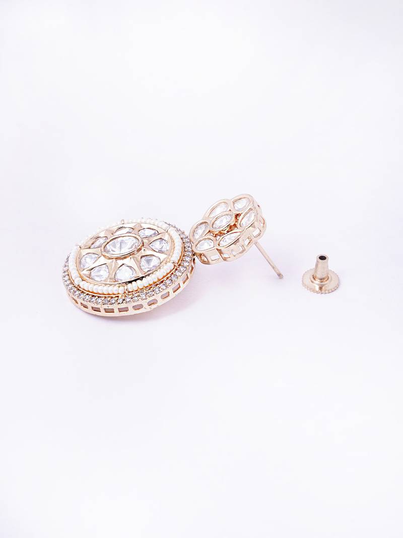 Women gold finish earrings featuring sparkling diamond embellishments