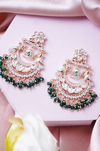 Women  earrings with diamond stones and green bead accents