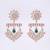 Women gold-plated ethnic dangle earrings with green kundan and bead embellishments
