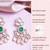 Women gold plated earrings with colorful stone centerpiece
