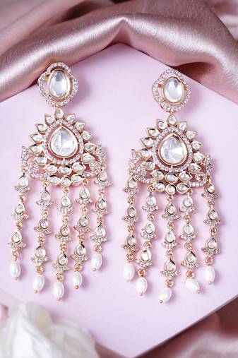 Women elegant white kundan with vibrant colored stone accents