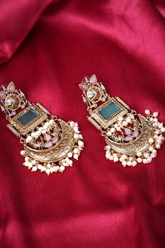 Women silver finish replica earrings with dangle design